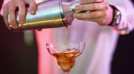 Craft cocktail being poured