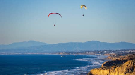 Couple parasailing in San Diego