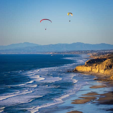 Couple parasailing in San Diego