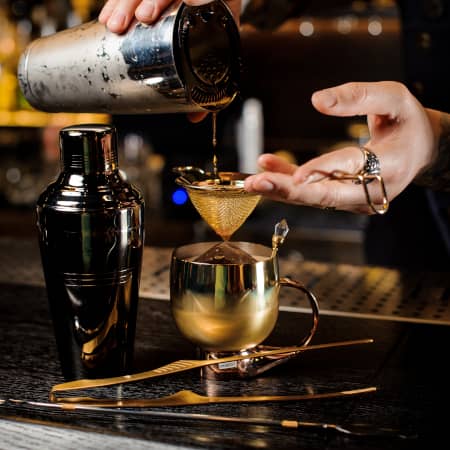 Mixologist at a Speakeasy