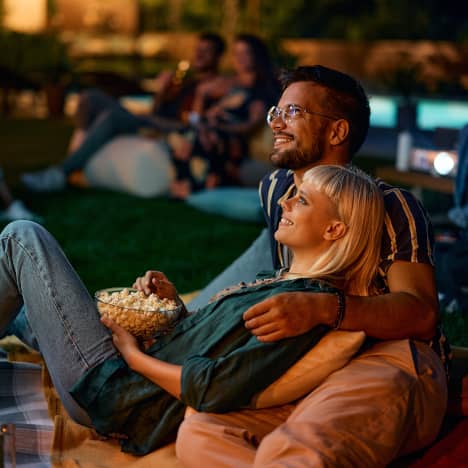 Couple at outdoor movie screening