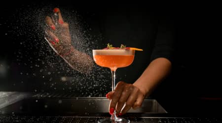 Mixologist preparing fancy cocktail