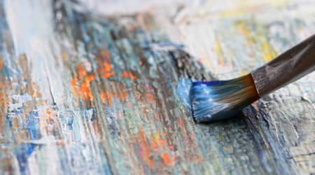 Paintbrush on modern art piece