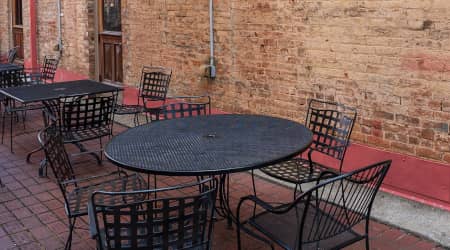 Outside seating near brick building