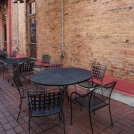 Outside seating near brick building