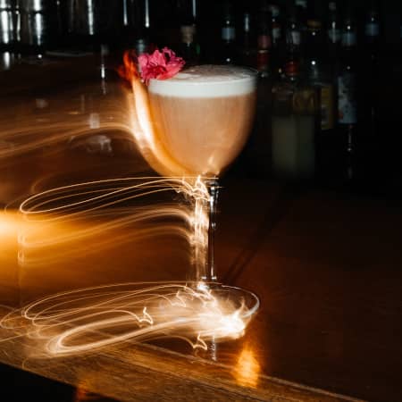 Drink being served at exclusive bar