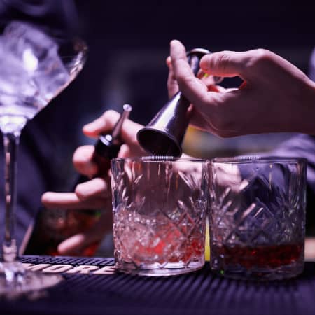 Cocktail pour in a speakeasy