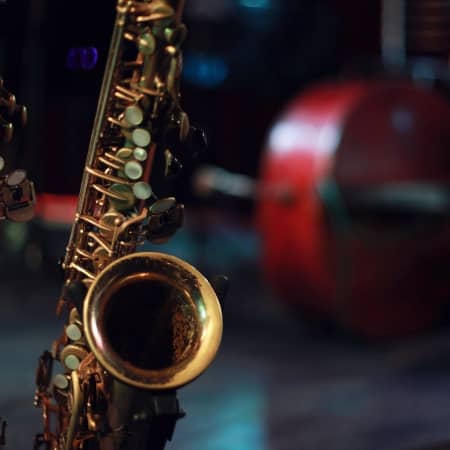 Saxophone and bass on stage